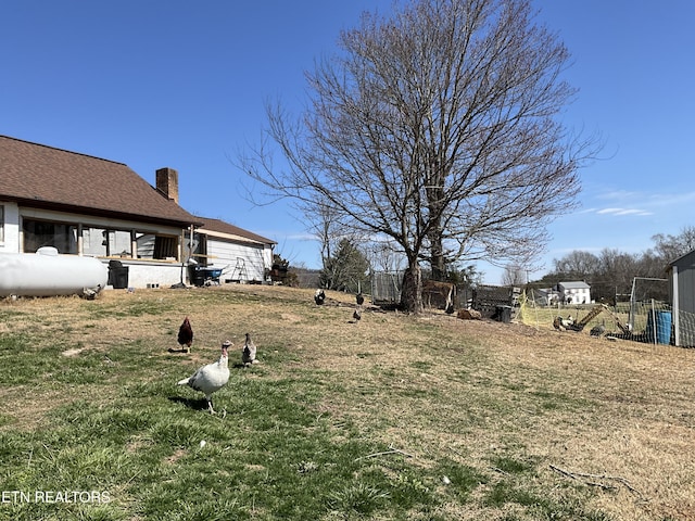 view of yard featuring fence