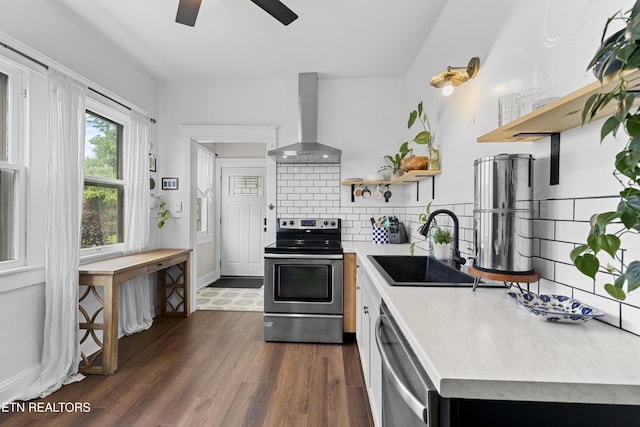 1321 N 4th Ave, Knoxville, TN 37917 - kitchen featuring wall chimney range hood, a ceiling fan, appliances with stainless steel finishes, open shelves, and light countertops