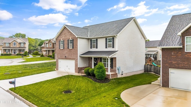 1724 Golden Nugget Ln, Knoxville, TN 37932 - traditional-style house with driveway, an attached garage, a residential view, brick siding, and roof with shingles