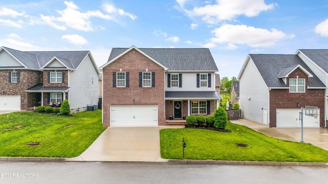 1724 Golden Nugget Ln, Knoxville, TN 37932 - traditional-style home with driveway, brick siding, an attached garage, a front lawn, and cooling unit