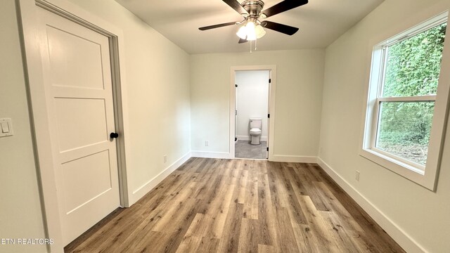 210 Spruce St, Athens, TN 37303 - unfurnished room with baseboards, ceiling fan, and light wood-style flooring