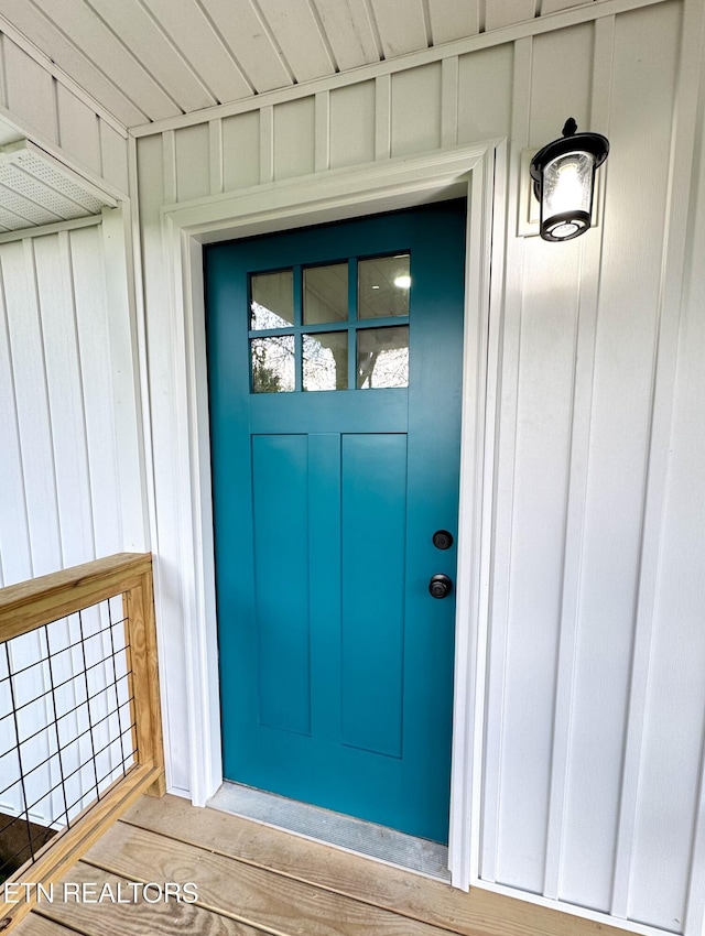 210 Spruce St, Athens, TN 37303 - entrance to property with board and batten siding