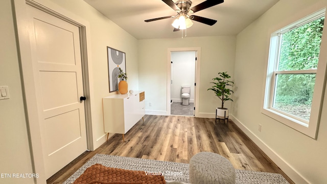 210 Spruce St, Athens, TN 37303 - corridor with baseboards and wood finished floors