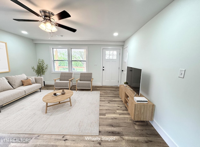 210 Spruce St, Athens, TN 37303 - living room with recessed lighting, baseboards, visible vents, and wood finished floors
