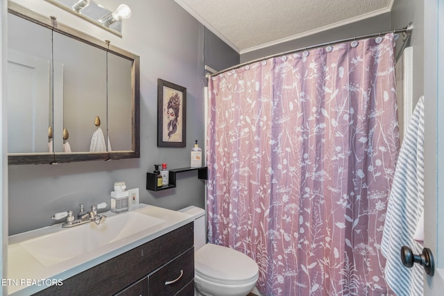 bathroom with toilet, crown molding, curtained shower, a textured ceiling, and vanity