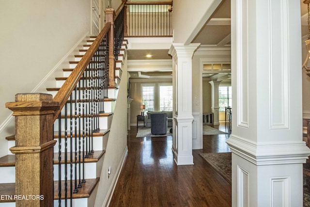 719 Lake Vista Ln Unit 3, Knoxville, TN 37934 - foyer entrance featuring crown molding, dark wood-style flooring, ornate columns, and stairs