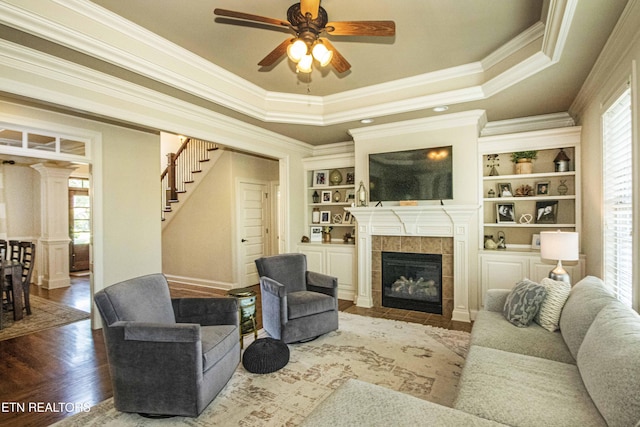 719 Lake Vista Ln Unit 3, Knoxville, TN 37934 - living room featuring crown molding, ceiling fan, and a healthy amount of sunlight