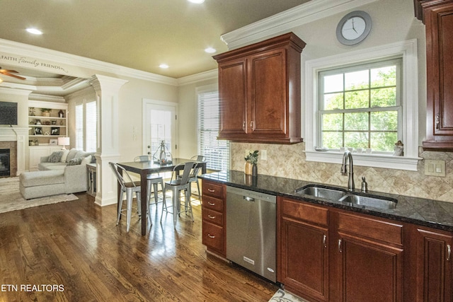 719 Lake Vista Ln Unit 3, Knoxville, TN 37934 - kitchen with dark wood finished floors, a glass covered fireplace, a sink, and dishwasher
