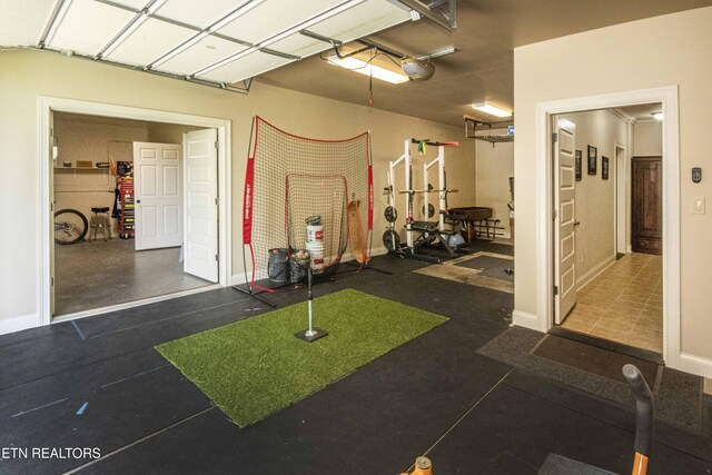 719 Lake Vista Ln Unit 3, Knoxville, TN 37934 - garage featuring baseboards