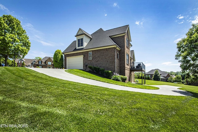 719 Lake Vista Ln Unit 3, Knoxville, TN 37934 - view of property exterior with brick siding, a garage, a lawn, and driveway
