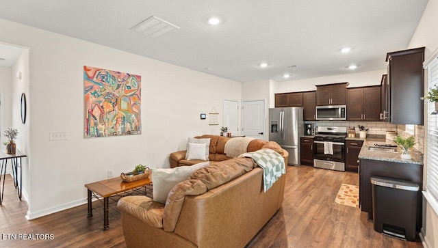 935 Curly Top Ln, Knoxville, TN 37932 - living area featuring dark wood finished floors, recessed lighting, and baseboards