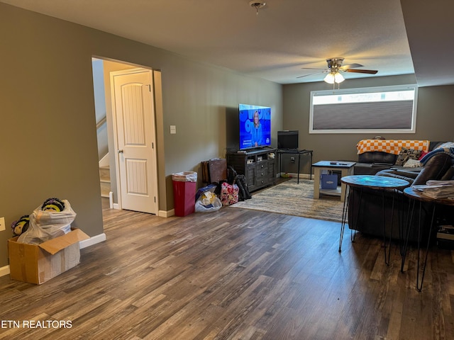 344 Kayla Ln, Oneida, TN 37841 - living room featuring baseboards, wood finished floors, and a ceiling fan