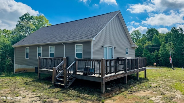 344 Kayla Ln, Oneida, TN 37841 - back of property with a wooden deck and roof with shingles