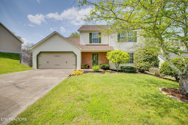 traditional-style home featuring concrete driveway, a garage, brick siding, and a front yard