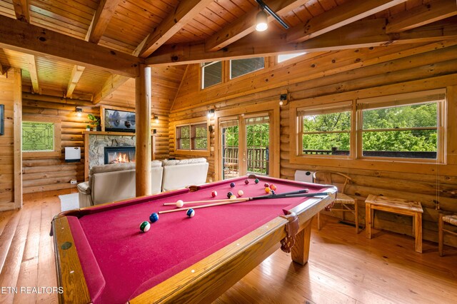 recreation room with pool table, wood ceiling, hardwood / wood-style flooring, and rustic walls