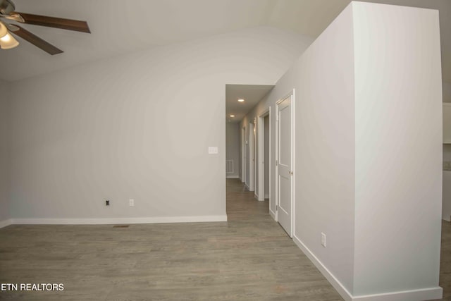 3328 Wimpole Ave, Knoxville, TN 37914 - spare room with a ceiling fan, vaulted ceiling, wood finished floors, baseboards, and recessed lighting