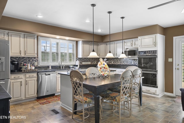 dining space featuring baseboards, ceiling fan, recessed lighting, and visible vents