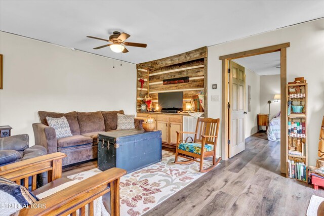 1424 Clabo Hollow Rd, Sevierville, TN 37876 - living room with ceiling fan and light wood-style flooring