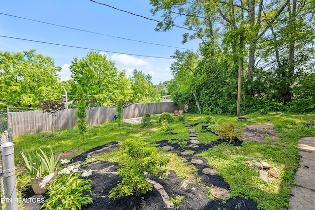 view of yard featuring fence