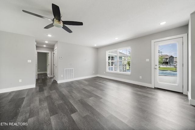 2934 Eledge Ln, Sevierville, TN 37876 - unfurnished living room featuring dark wood-type flooring, ceiling fan, baseboards, and recessed lighting