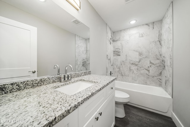 2934 Eledge Ln, Sevierville, TN 37876 - full bath with toilet, vanity, wood finished floors, shower / bathtub combination, and recessed lighting