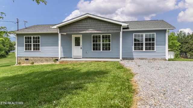 2934 Eledge Ln, Sevierville, TN 37876 - ranch-style house featuring a front lawn, a porch, crawl space, and roof with shingles