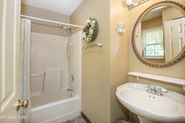 full bathroom featuring a sink and shower / tub combo