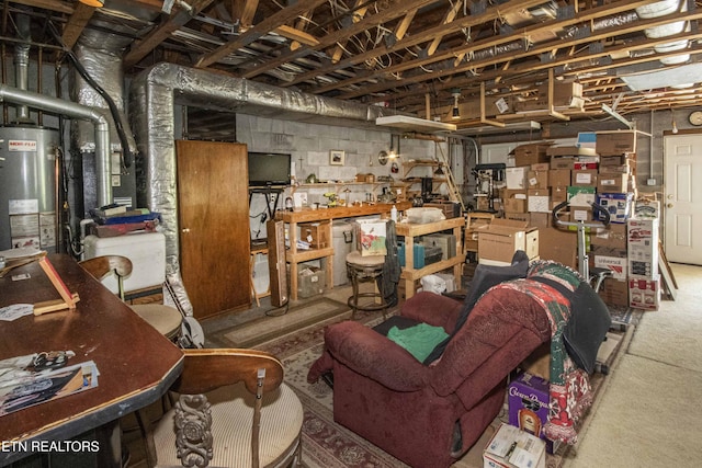 unfinished basement with gas water heater