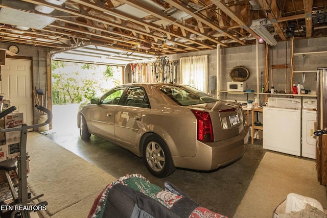 garage featuring separate washer and dryer