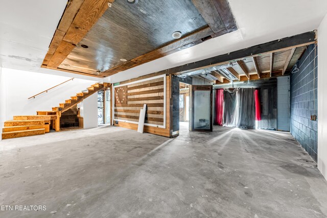 2208 Island Blvd, Sevierville, TN 37876 - below grade area featuring stairway and concrete block wall