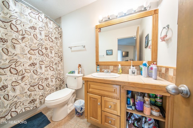 57 Eagle Ct, Crossville, TN 38558 - full bath featuring toilet, tile patterned flooring, vanity, decorative backsplash, and curtained shower