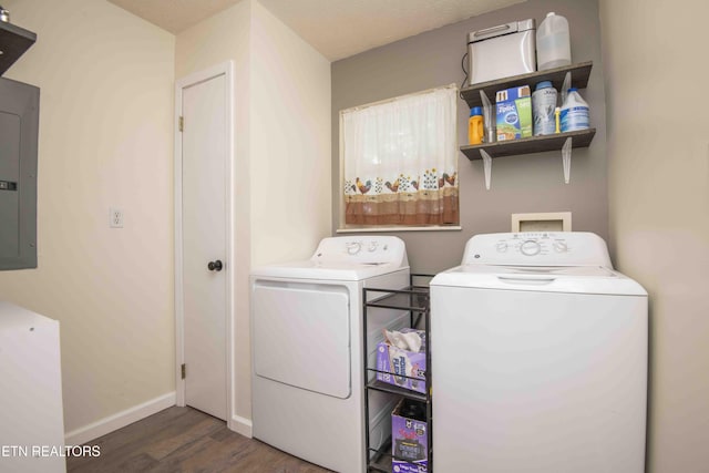 clothes washing area with laundry area, wood finished floors, baseboards, electric panel, and independent washer and dryer