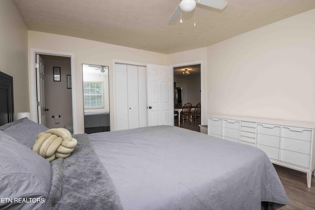 bedroom with a closet, ceiling fan, and wood finished floors