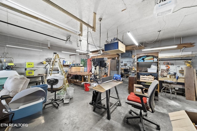 garage with a workshop area