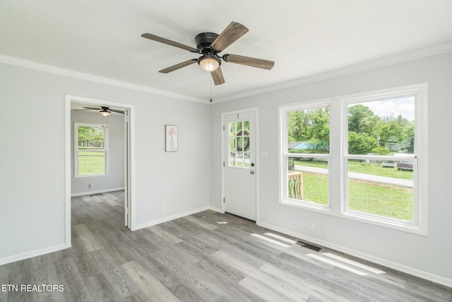 309 Evergreen St, Harriman, TN 37748 - interior space with baseboards, ornamental molding, and wood finished floors