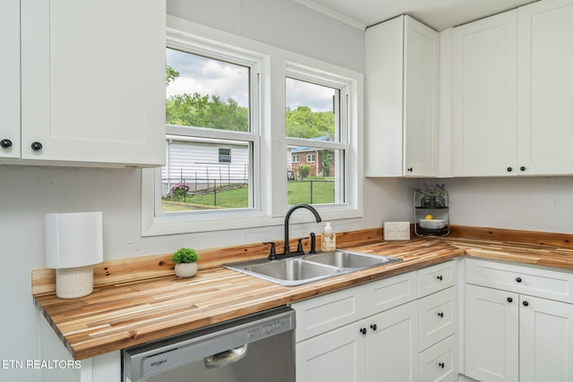 309 Evergreen St, Harriman, TN 37748 - kitchen with butcher block countertops, a sink, and stainless steel dishwasher