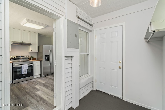 309 Evergreen St, Harriman, TN 37748 - kitchen featuring appliances with stainless steel finishes, electric panel, butcher block counters, and dark wood-style floors
