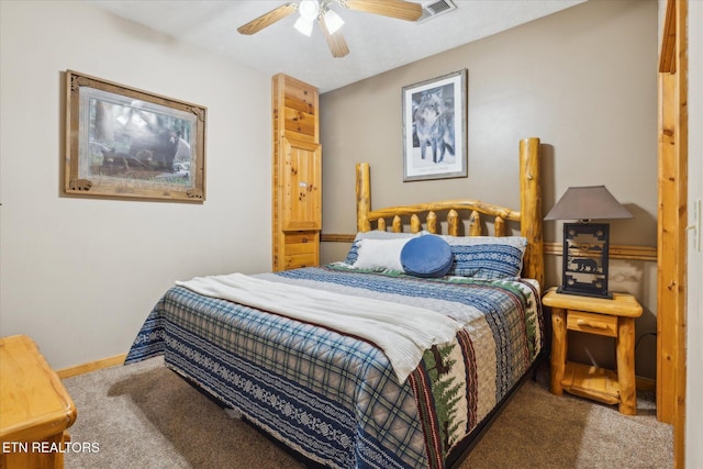 bedroom with baseboards, carpet, a ceiling fan, and visible vents