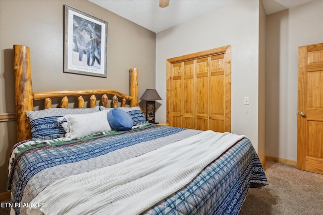 bedroom featuring a closet, a ceiling fan, carpet, and baseboards