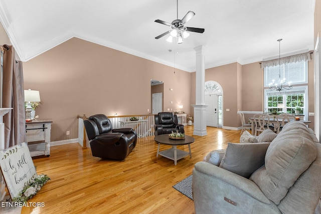 4322 Wellesley Dr, Ooltewah, TN 37363 - living area featuring crown molding, ceiling fan with notable chandelier, light wood-style flooring, and lofted ceiling