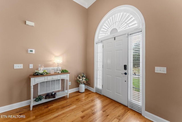 4322 Wellesley Dr, Ooltewah, TN 37363 - entrance foyer with baseboards, ornamental molding, and light wood-style floors