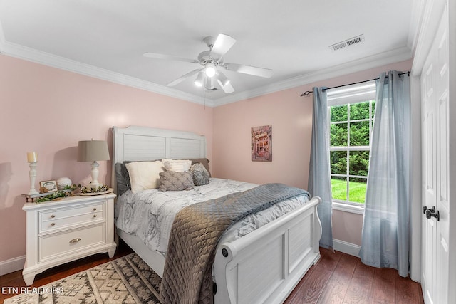 4322 Wellesley Dr, Ooltewah, TN 37363 - bedroom with ceiling fan, dark wood-style flooring, visible vents, crown molding, and baseboards