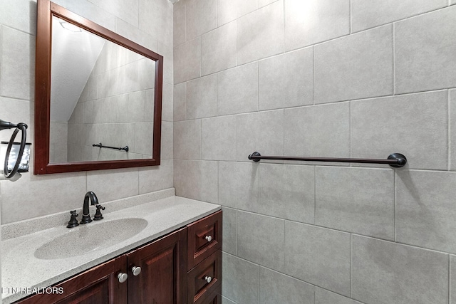 4322 Wellesley Dr, Ooltewah, TN 37363 - bathroom with vanity and tile walls