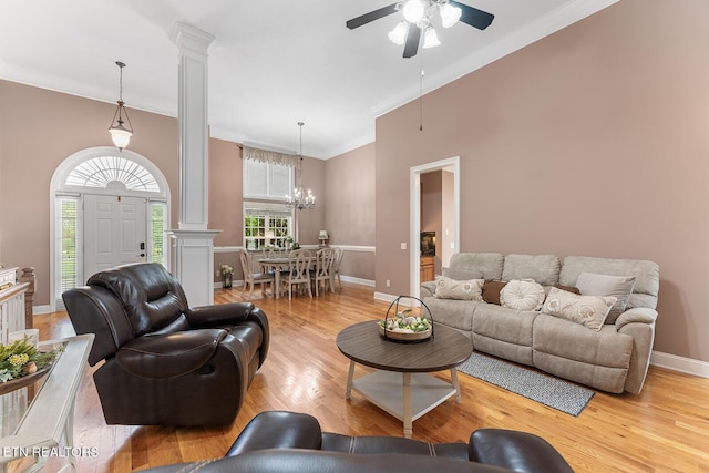4322 Wellesley Dr, Ooltewah, TN 37363 - living room featuring baseboards, ornamental molding, decorative columns, and light wood-style flooring