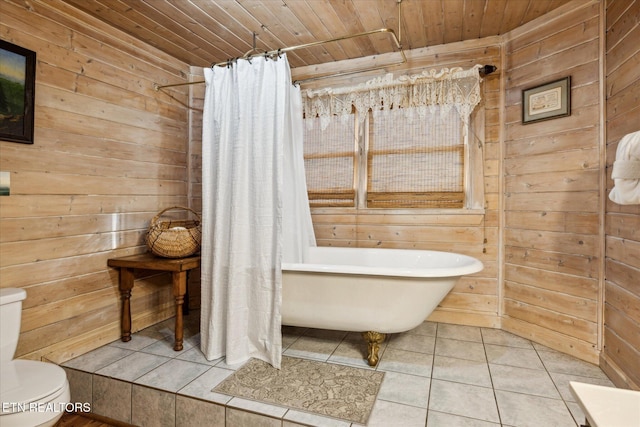 full bath featuring wood walls, wooden ceiling, and a soaking tub