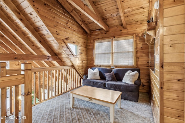 living area with wooden walls, wooden ceiling, vaulted ceiling with beams, and carpet flooring