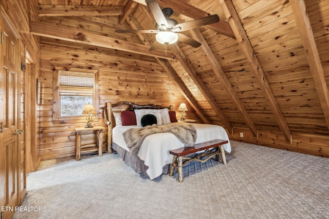 carpeted bedroom with wooden walls, a ceiling fan, wooden ceiling, and vaulted ceiling with beams