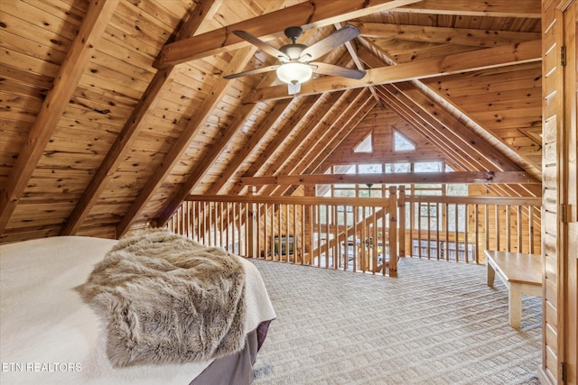 bedroom with vaulted ceiling with beams, carpet, and wooden ceiling
