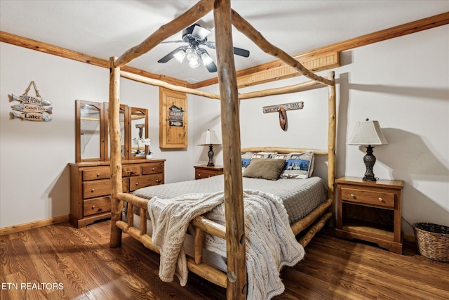 bedroom with baseboards, ceiling fan, and wood finished floors