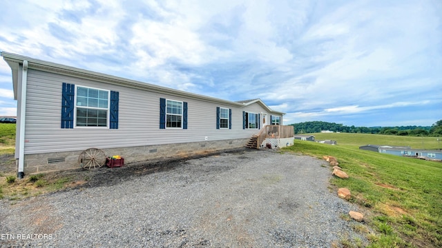 210 Schertz Ln, Rutledge, TN 37861 - view of front facade featuring a front yard, driveway, and crawl space